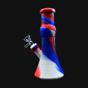 710 Pipes Smoke Shop 9-inch silicone beaker water pipe featuring a red, white, and blue swirl pattern with glass bowl