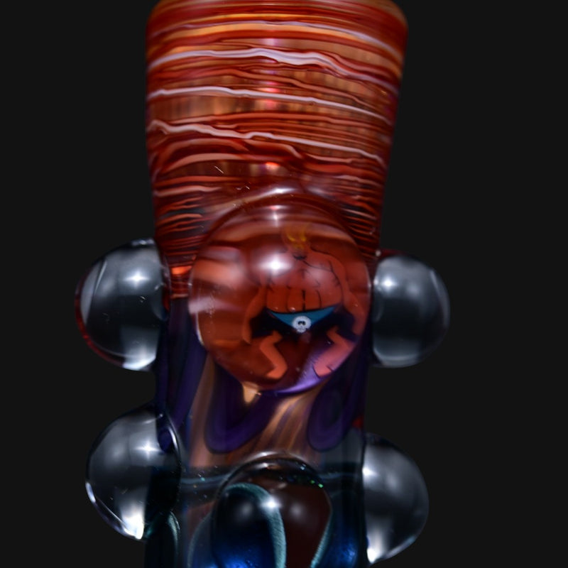 710 Pipes Smoke Shop Matty White South Park glass one hitter pipe with orange swirl patterns and character marble