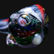 710 Pipes Smoke Shop Matty White glass spoon pipe featuring intricate dichro banding and a Spongebob Gary design.