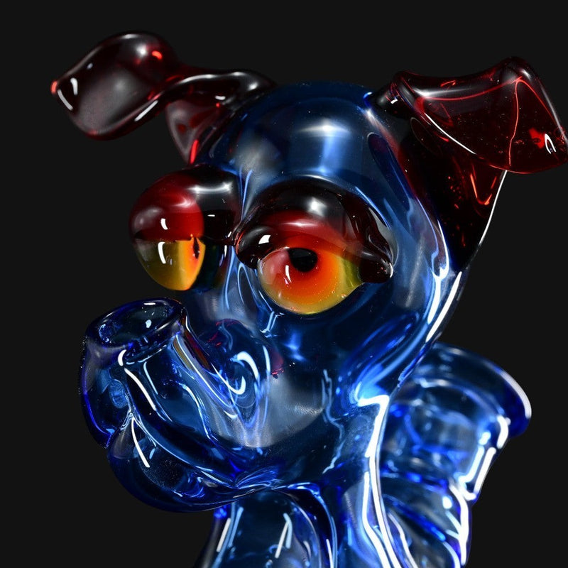 710 Pipes Smoke Shop T_Tree Glass Ruffer jammer featuring a blue dog design with red ears and amber eyes.