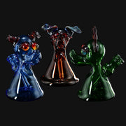 Three T_Tree Glass Ruffer dog-shaped glass jammers in blue, amber, and green from 710 Pipes Smoke Shop
