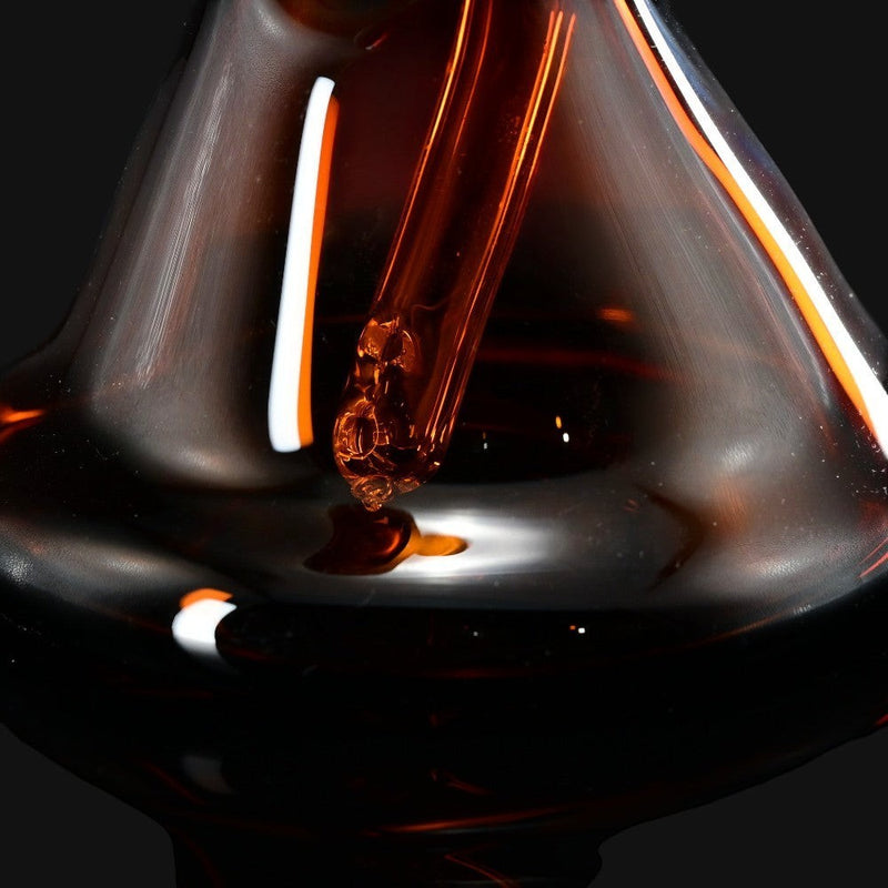 710 Pipes Smoke Shop T_Tree Glass Ruffer jammer featuring a deep amber borosilicate glass design on black background