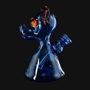 710 Pipes Smoke Shop T_Tree Glass Ruffer jammer in translucent blue glass with unique amber-toned accents.