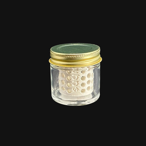 710 Pipes Smoke Shop terp pearl washing station with a clear glass jar, gold lid, and white honeycomb insert.