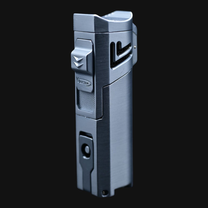 710 Pipes Smoke Shop Vector Quattro torch lighter in a brushed gunmetal finish with a sleek, modern design.