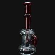 710 Pipes Smoke Shop clear glass water pipe with dark red accents and a thick base.