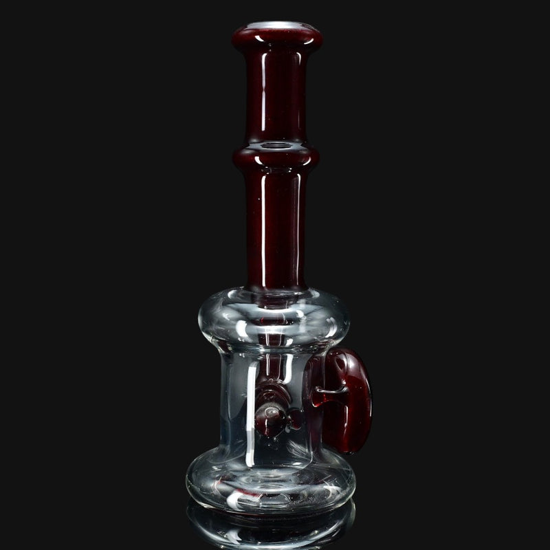 710 Pipes Smoke Shop clear glass water pipe with dark red accents and a thick base.