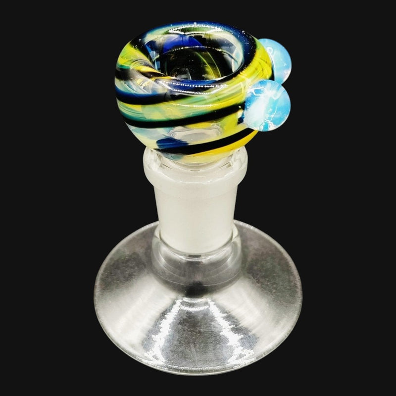 710 Pipes Smoke Shop Westie Glass 14mm bowl slide featuring yellow, blue, and black swirl patterns with glass nubs.
