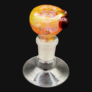 710 Pipes Smoke Shop Westie glass 14mm bowl slide featuring a vibrant orange and yellow swirl pattern with red accents.