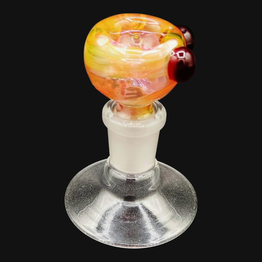 710 Pipes Smoke Shop Westie glass 14mm bowl slide featuring a vibrant orange and yellow swirl pattern with red accents.
