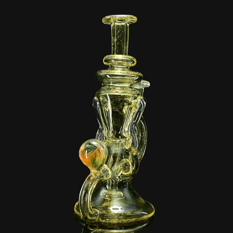 710 Pipes Smoke Shop Wiscokid Klein Recycler dab rig in Serum CFL color with a 10mm joint and a marble accent.