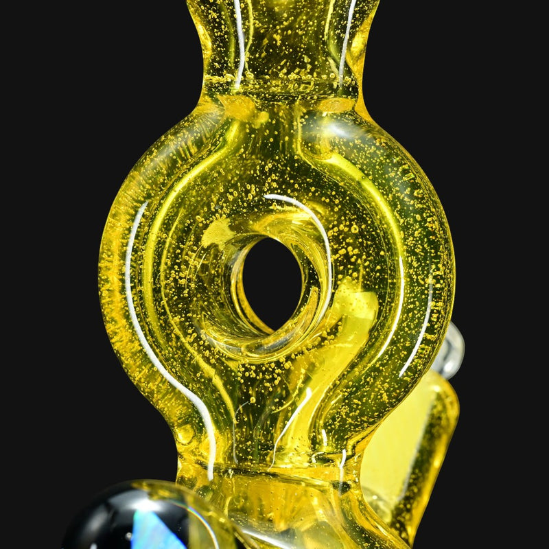 710 Pipes Smoke Shop yellow glass donut rig with a 2-hole downstem and donut mouthpiece.