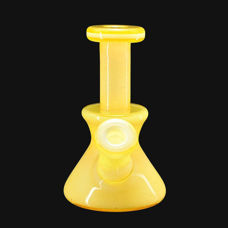 710 Pipes Smoke Shop yellow glass micro dab rig with 10mm joint and flared mouthpiece.