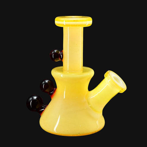 710 Pipes Smoke Shop yellow glass micro time tube with 10mm joint and dark red accents.
