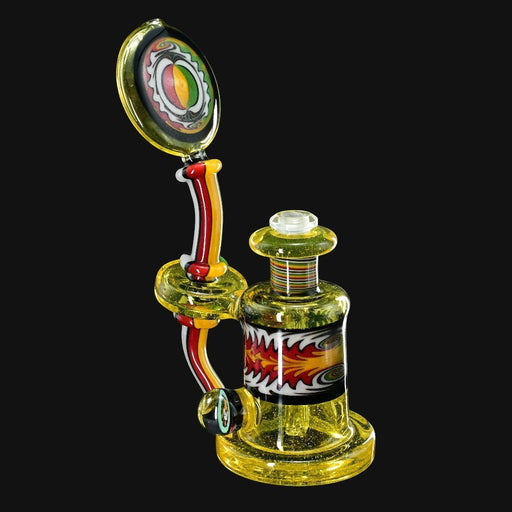 710 Pipes Smoke Shop yellow glass rig with red, yellow, and white accents and a flame design.