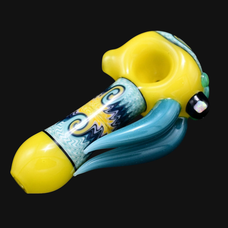 710 Pipes Smoke Shop yellow glass spoon pipe with blue wig wag design and aqua accents