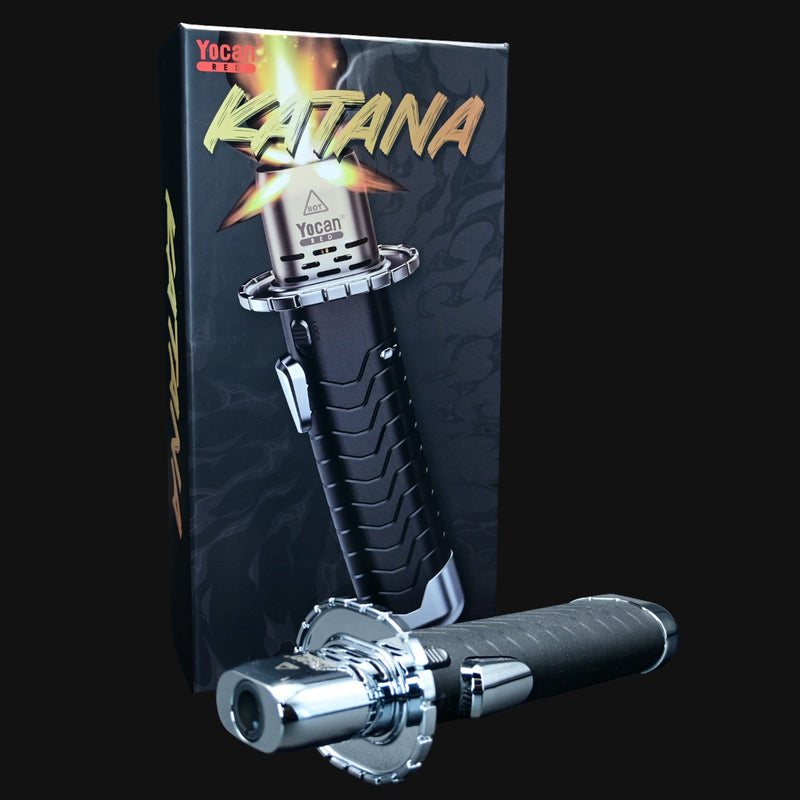 710 Pipes Smoke Shop YoCan Katana Torch with black ergonomic handle and silver metal nozzle in front of product box