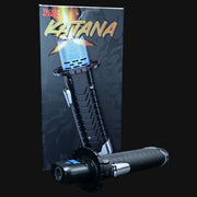 710 Pipes Smoke Shop YoCan Katana butane torch with ergonomic black grip and safety lock in front of product packaging