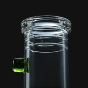 Clear glass mouthpiece of a 710 Pipes Smoke Shop Zombie Hand water pipe with an absinthe green glass accent.