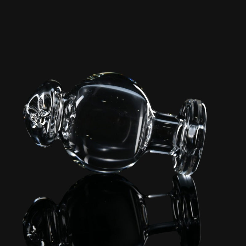 710 Pipes Smoke Shop clear glass Zombie Hand Spinner Bubble Cap for dabbing with a reflective black background.