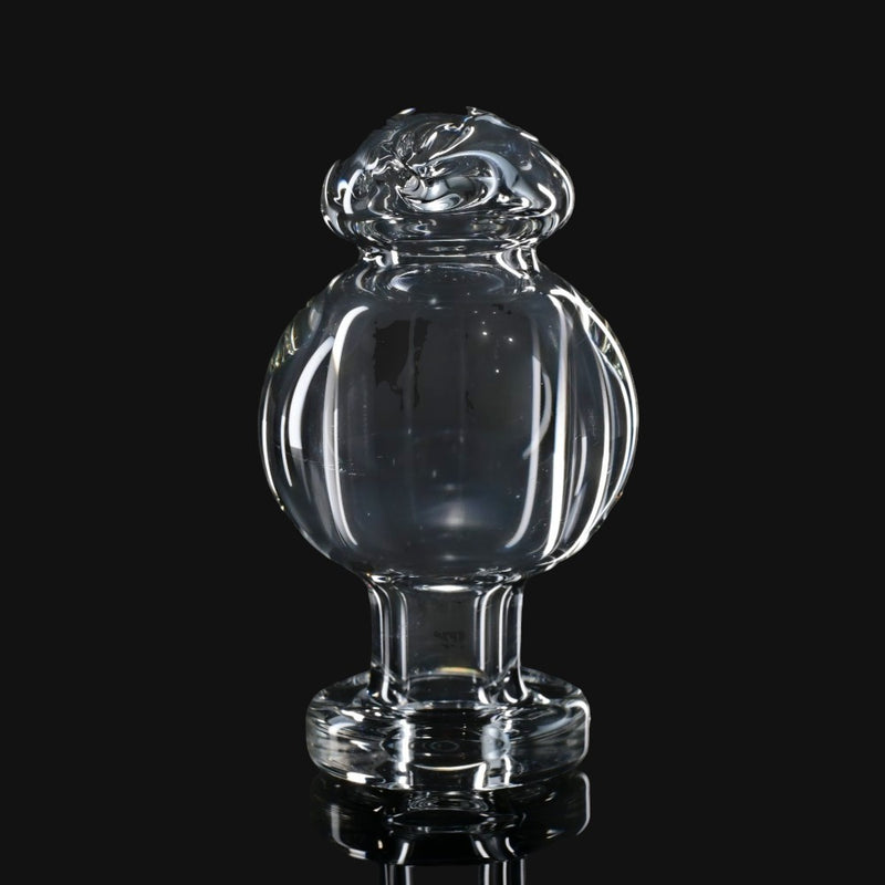 710 Pipes Smoke Shop clear glass Zombie Hand Spinner Bubble Cap for dabbing with a rounded top and ribbed design.
