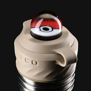 710 Pipes Smoke Shop Zombie Hands Studios Peak Pro Millie Cap featuring a glass pokeball design on a tan base.
