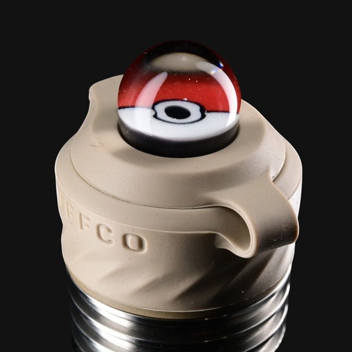 710 Pipes Smoke Shop Zombie Hands Studios Peak Pro Millie Cap featuring a glass pokeball design on a tan base.