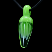 Green glass pendant on a black background