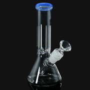 8-inch clear glass beaker water pipe with a periwinkle blue lip accent, sold by 710 Pipes Smoke Shop