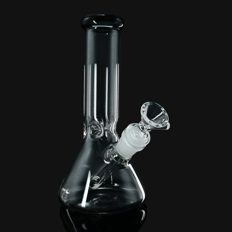 8-inch clear glass beaker water pipe with black smoke  lip accent from 710 Pipes Smoke Shop on a black background.
