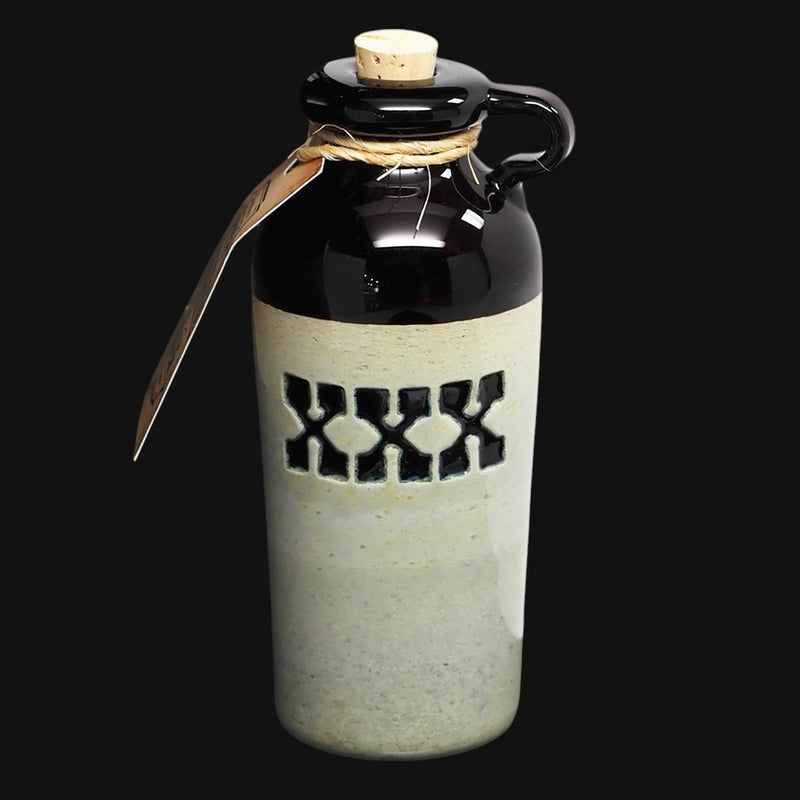 710 Pipes Smoke Shop Cody Wade camo moonshine bottle rig with XXX detail, 10mm joint, and 2-hole diffuser.