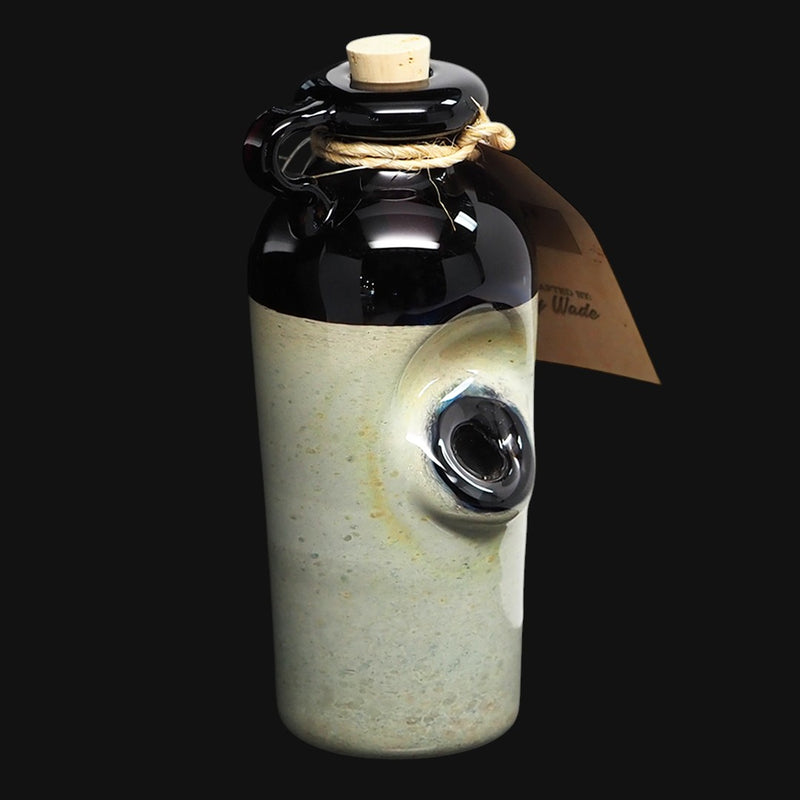 710 Pipes Smoke Shop Cody Wade camo moonshine bottle glass rig with a black top and 10mm joint