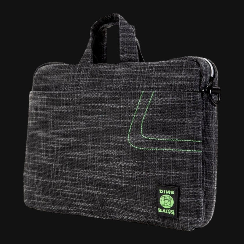 Dime Bags Side Hustler 17 inch laptop bag in black textured fabric with green accent stitching.