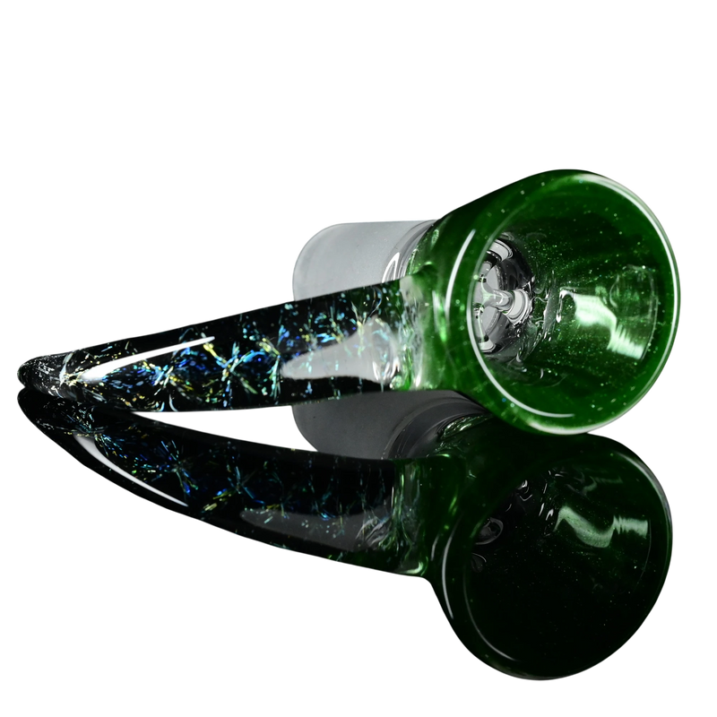 lay down view of Kadabra 14mm Slide bowl in the color of Green Stardust for smoking