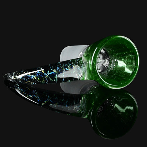 lay down view of Kadabra 14mm Slide bowl in the color of Green Stardust for smoking