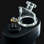 710 Pipes Smoke Shop Kadabra Dr. Dabber Switch2 Milli glass joystick carb cap with colorful patterned head and clear stem.