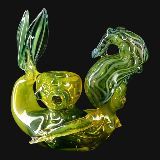 Lyric Mermaid Pipe green laying on her stomach