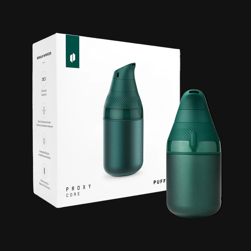 Puffco Core kit in the green pin color way next to the box