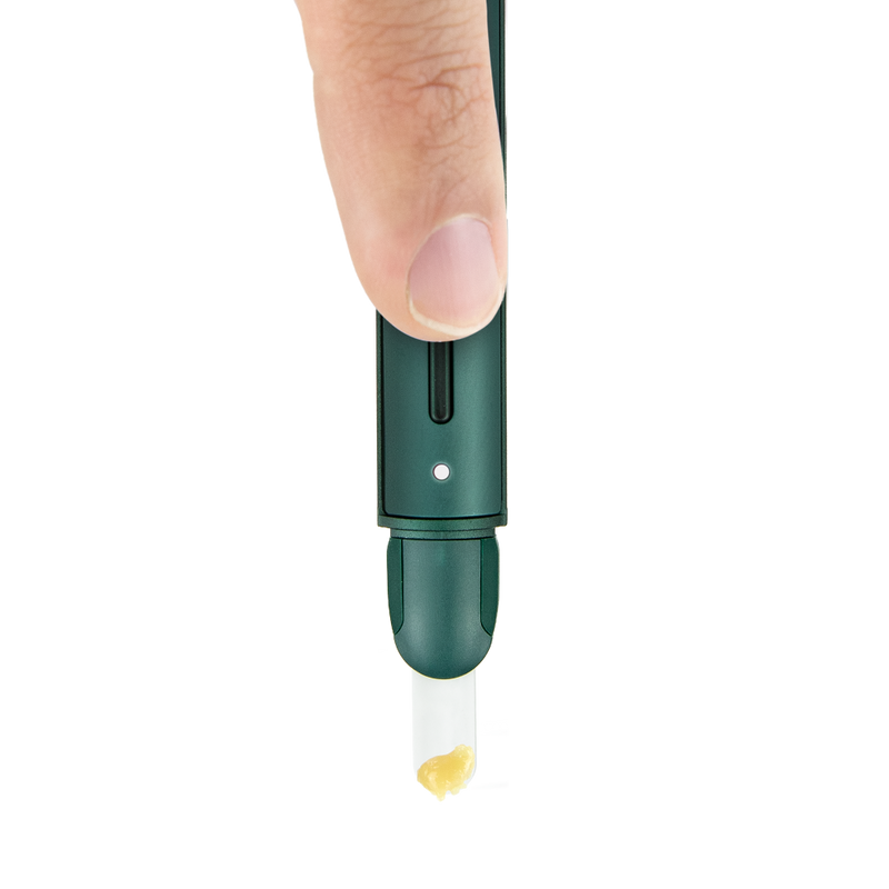 Puffco Hot Knife Pine in use with finger