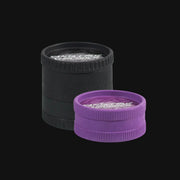 710 Pipes Smoke Shop Santa Cruz ECO hemp bud grinders in black and purple with textured grip edges.