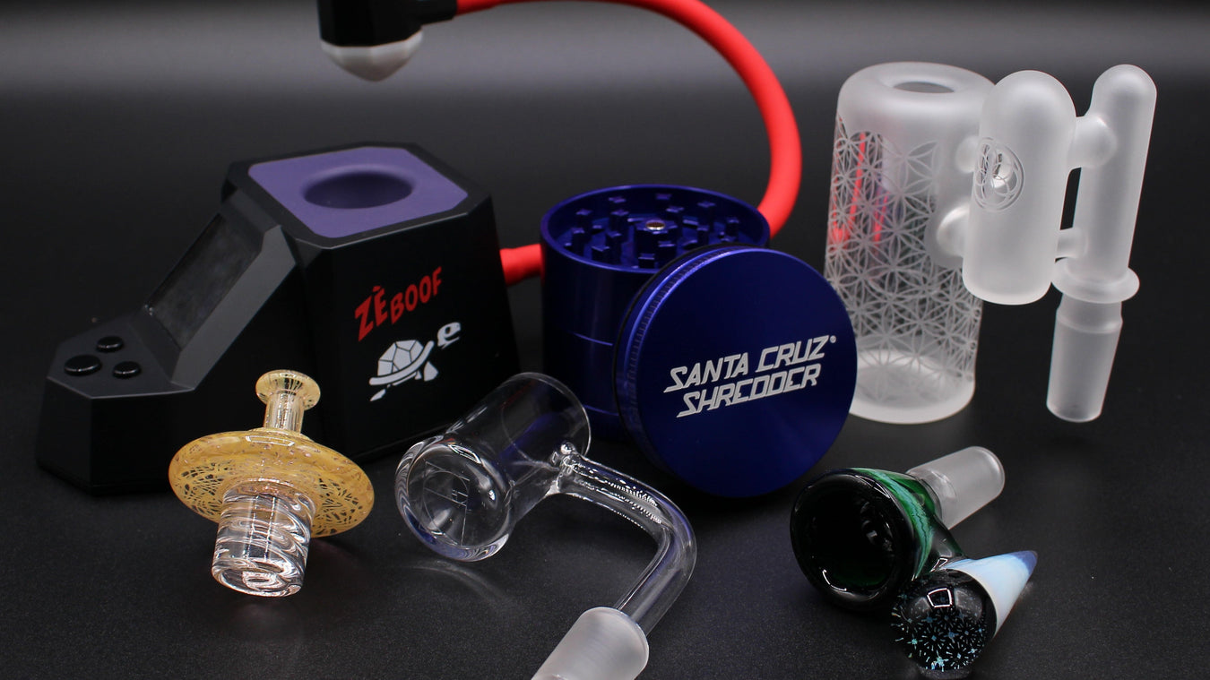 Collection of smoking accessories on a black background