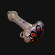 glass spoon pipe featuring iridescent finish and colorful jellyfish flower design