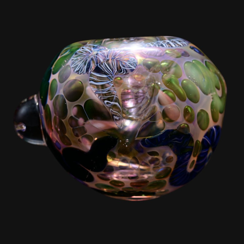 ISO worm spoon glass pipe with intricate milli and iridescent green and blue patterns