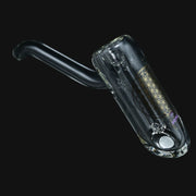 clear glass bubbler featuring a gold sacred geometry flower of life design on a black background