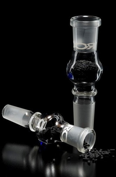 Glass piece with a black activated carbon filter attachment