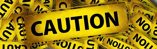 Yellow "caution" tape warns readers of potential danger