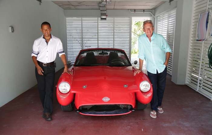Bruce Dietzen poses with hemp-based car he built