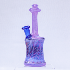 Side view of dab rig with lavender neck, intricately colored base and blue mouthpiece by Denver-area artist Lyric Glass.
