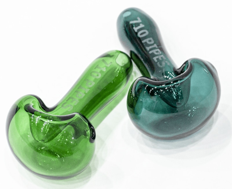 Adjacent green and blue glass hand pipes by 710 Pipes