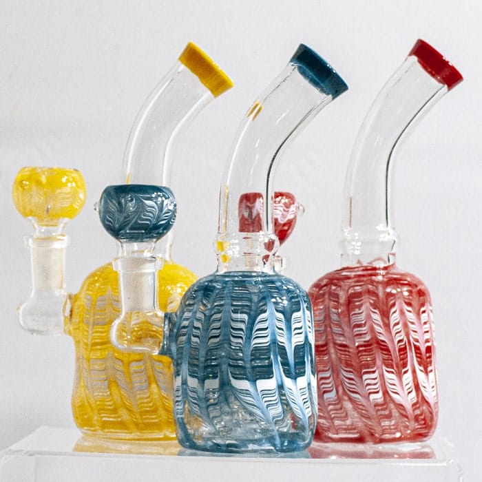 Several feathered miniature water pipes in assorted colors